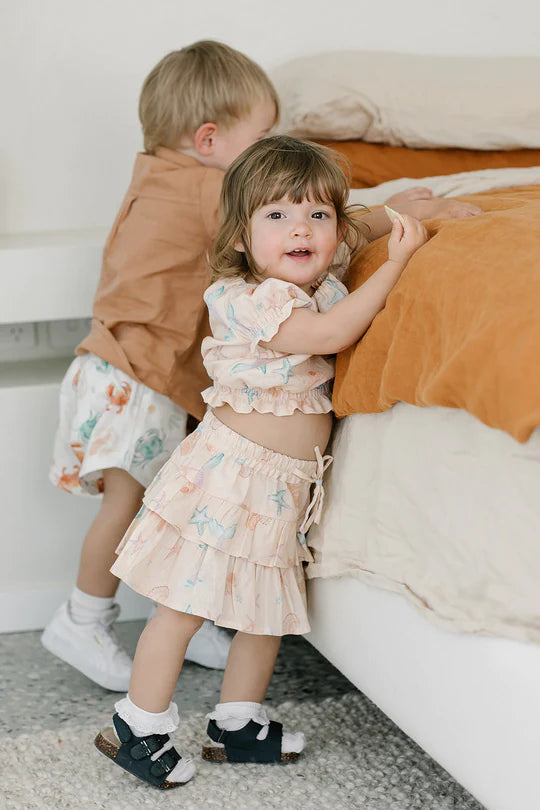 Duke & Duchesses Cali Ruffle Skirt - Cream Seashells Print
